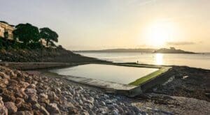 Sunrise over Firestone Bay sea pool