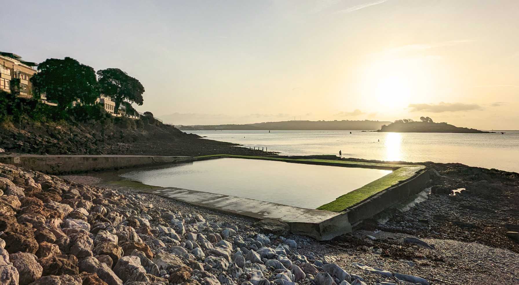 Sunrise over Firestone Bay sea pool