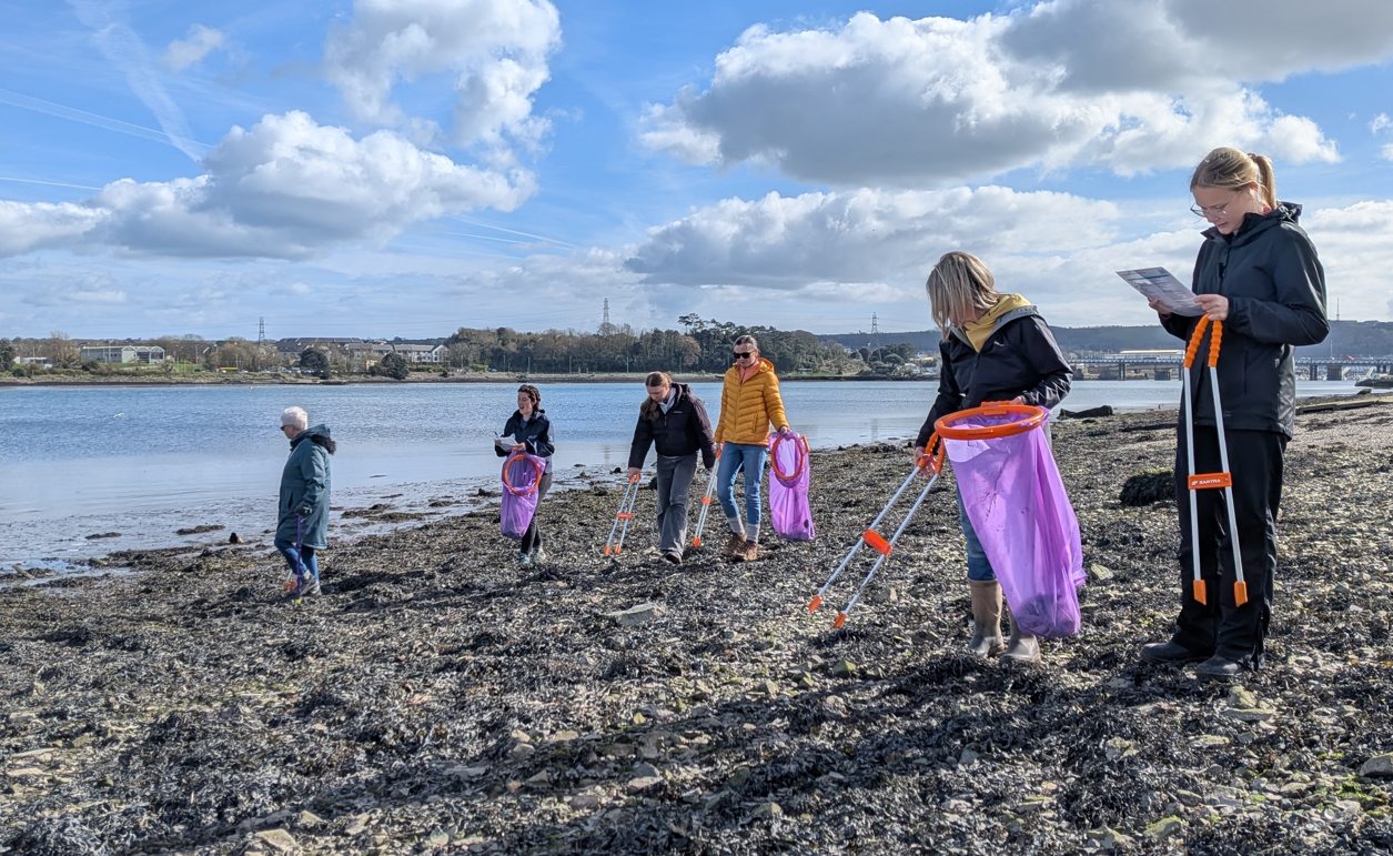 Plymouth Sound National Marine Park Coastal Rangers and volunteers litterpicking during a Coastal Clean Up event at Blagdons Meadow.